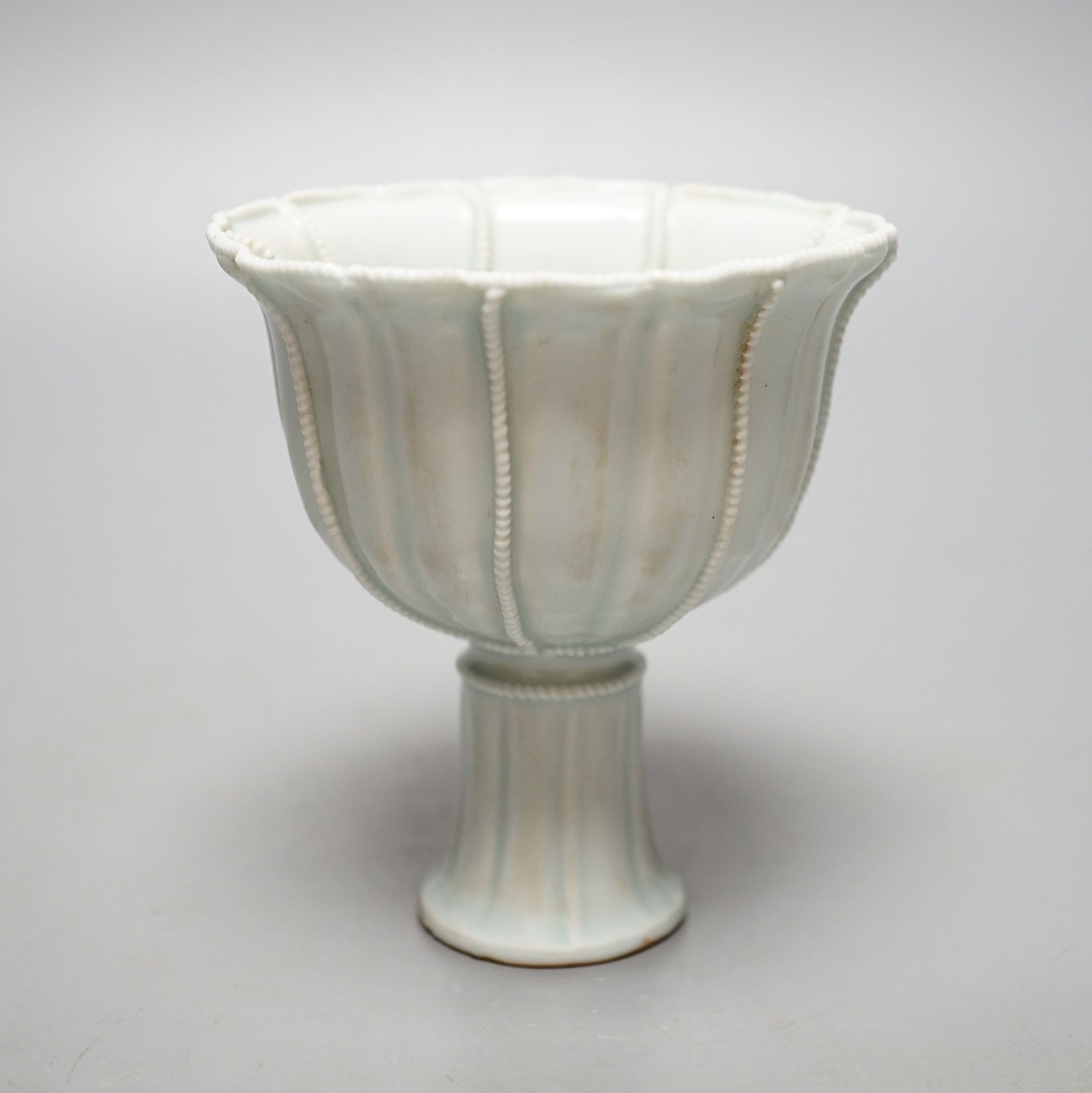 A Chinese Qingbai type stem cup., 10 cms high.